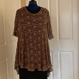 Brown and beige lace tunic with light brown trim on neckline and sleeves.
